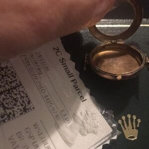 Rolex real gold 9count means karats from England marked Rolex locket case.